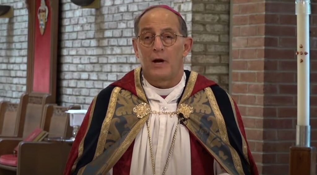Episcopal bishop who required gay clergy to marry their partners announces retirement