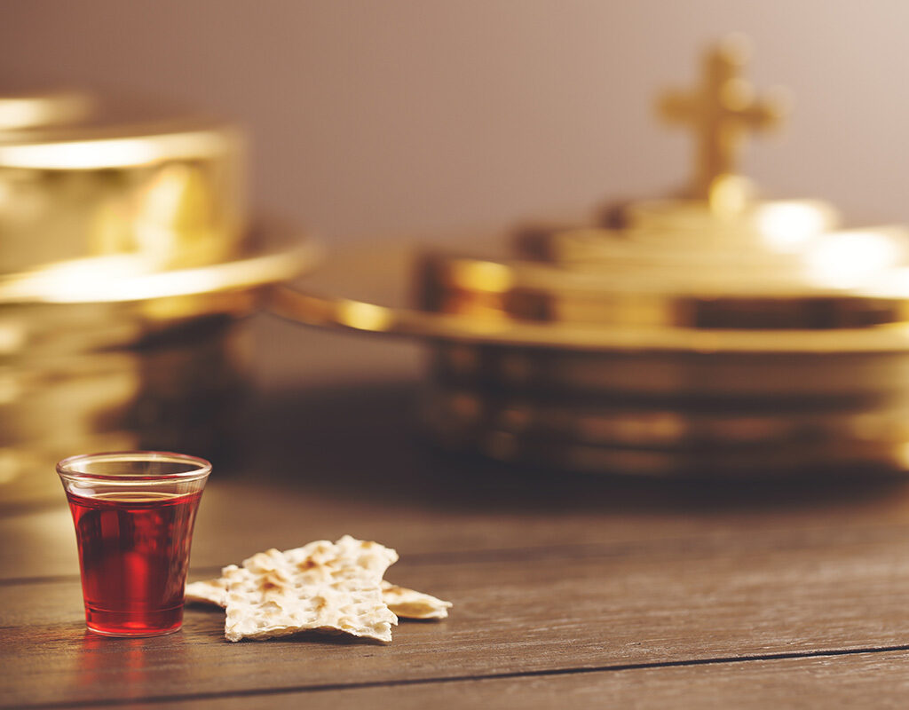 Female pastor faces backlash for draping ‘un-Christian emblem’ over Communion table